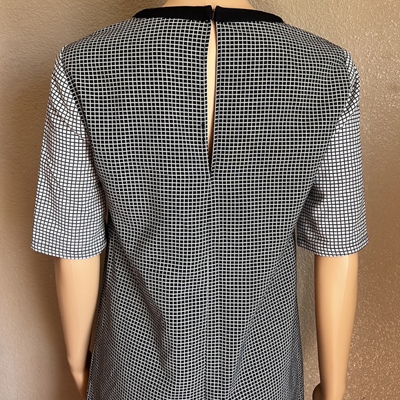 BCBGENERATION Black & White Checkered
Sheath Dress with Sheer V Neck Size XS - Picture 8 of 12